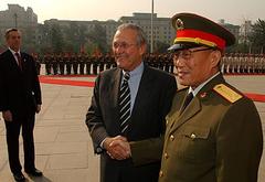 United States Defense Secretary Donald Rumsfeld greeted by General Cao Gangchuan in Beijing 2005