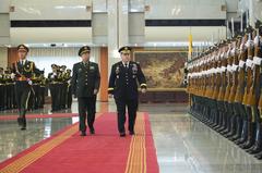 U.S. Army Chief of Staff General Mark A. Milley and PLA Ground Force Commander General Li Zuocheng inspect Chinese military contingent in Beijing