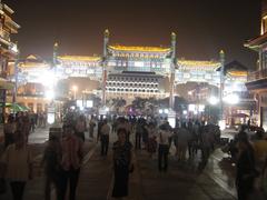 Qianmen Street in Beijing with traditional Chinese architecture and a bustling crowd