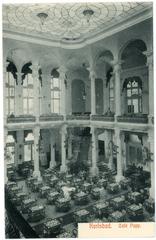 Interior view of Cafe Pupp in Karlsbad in 1906 with classic vintage decor and seating