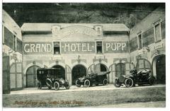 Early 20th century black and white photograph of Grand Hotel Pupp and Autogarage in Marienbad.