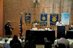 Rear Adm. Ricky Williamson answering a question at Cleveland Rotary Club during Navy's War of 1812 Bicentennial commemoration