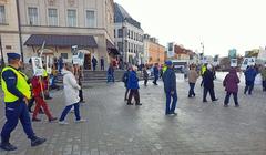 Demonstration in Warsaw with protesters holding banners and flags on April 10, 2023