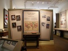 Exhibit panels with images and text about Edgar Allan Poe at the Edgar Allan Poe National Historic Site