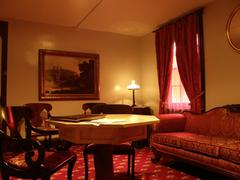 Interior of Edgar Allan Poe National Historic Site visitor center decorated in early 19th century style