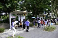 Bus shelter of NTU Sports Center at Xinxing South Road sidewalk in Taipei