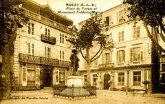 Place du Forum in Arles with historic buildings and outdoor seating