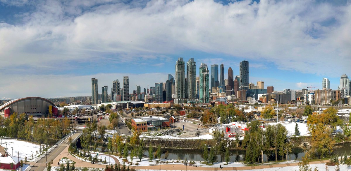 Calgary city skyline with modern skyscrapers and clear blue sky