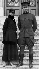 Mamie Eisenhower and Dwight D. Eisenhower sitting on steps of St. Louis Hall at St. Mary's University in 1916