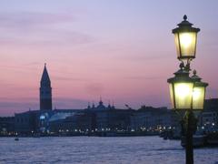 Venezia at night in March 2009 with illuminated historic buildings and reflections on water