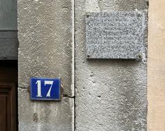 Street plaque dedicated to Patrice Berger on rue du Bon Pasteur in Lyon with street number