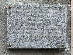 Memorial plaque dedicated to Patrice Berger on rue du Bon Pasteur, photographed on May 16, 2022
