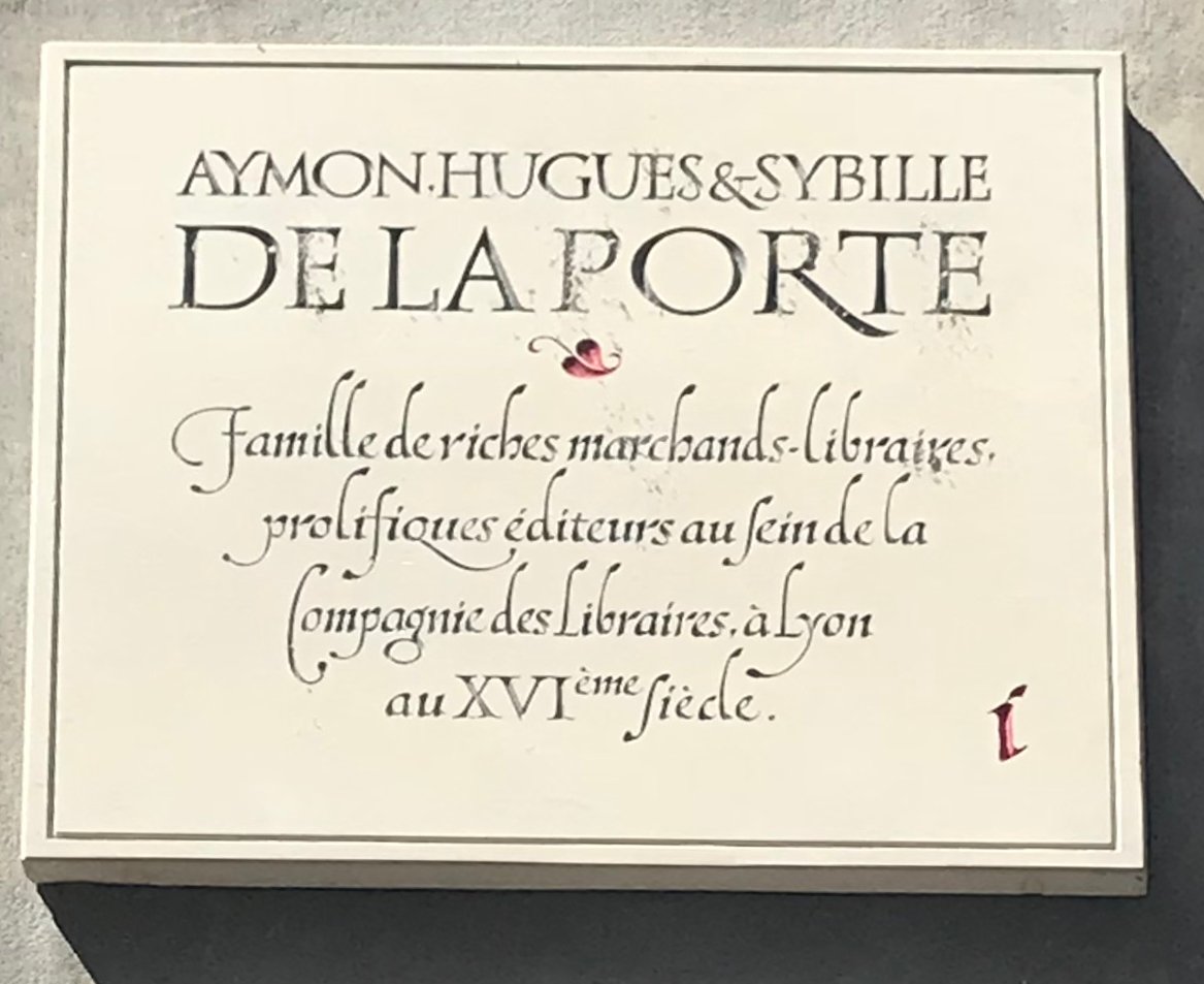 Street plaques of Aymon Hugues and Sybille de La Porte in Rue Mercière, Lyon