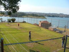 Tennis courts with scenic view of Sydney skyline from Cockatoo Island