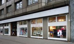 Interior view of The Living Room Galerie & Event Location in Düsseldorf with modern design and artwork