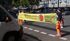 Traffic safety campaign sign Brems dich Schule hat begonnen with traffic cadets in Düsseldorf August 2020