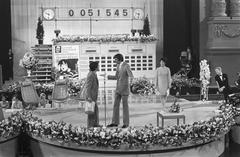 Kees van Kooten and Wim de Bie at Aktie Bisschop Bekkers event in Carré of Mies Bouwman, Amsterdam 1969 black and white photo