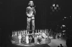Actors standing around a statue of Che Guevara during a general rehearsal of the opera Reconstructie at Carré theatre in Amsterdam, June 28, 1969