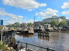 Amstelsluizen locks with Carré theatre in the background in Amsterdam