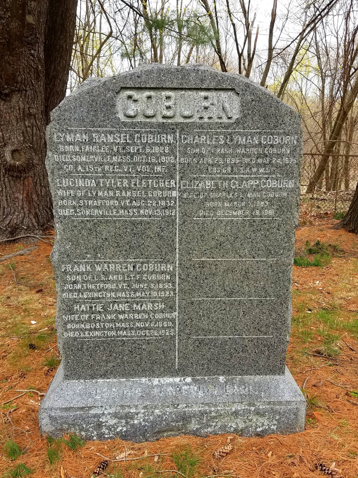 Munroe Cemetery in Lexington, Massachusetts with rows of old gravestones and trees