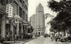 Sunset view of Guangzhou Xihou road near Aiqun Hotel, Datong Restaurant, and Boji Hospital