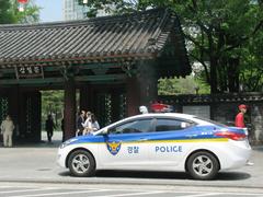 Police car parked on street in Seoul, South Korea