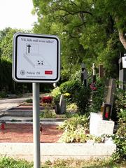 Police theft warning sign in Central Cemetery in Brno