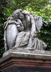Statue on a gravestone at Central Cemetery in Brno