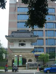 Bell Tower of Dong He Chan Monastery with Taipei City Youth Recreation Center in the background