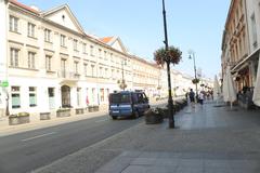 August 2018 sunny morning street view in Warsaw with modern and historic buildings