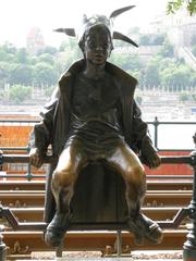 Statue of Little Princess in Budapest with blue sky