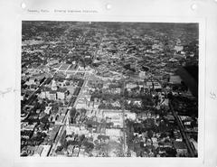 Historic black and white photo of downtown Denver, Colorado with multiple buildings and streets visible