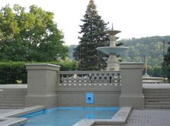 Water fountain in Gage Park with trees and walkway