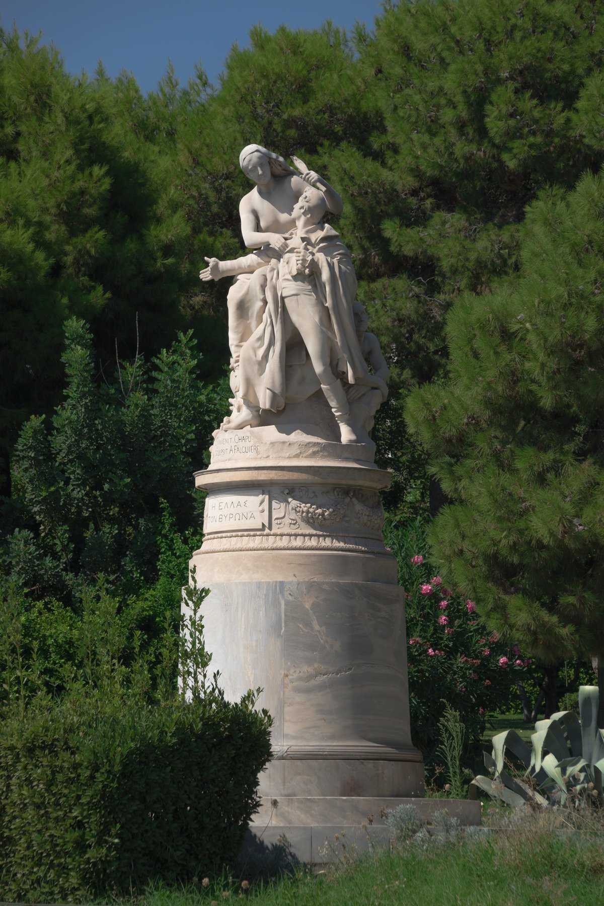 Monument to Lord George Gordon Byron in Athens, Greece with green trees