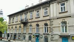 Street view of Krisztina körút in Budapest with tram tracks and city buildings