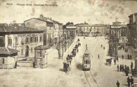 Tram passing through Piazza Vittorio Emanuele in Turin, Italy with historic buildings and street activity