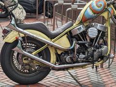 Motorcycle parked in Ebisu Garden Place urban area with modern buildings