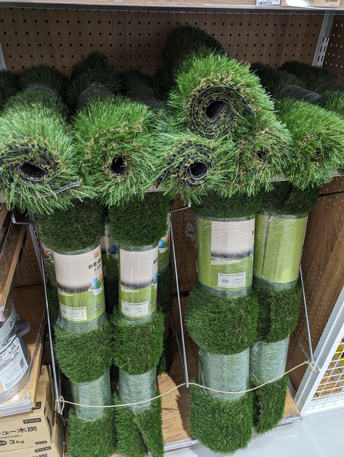Artificial turf rolls displayed for sale in a DIY shop in Tokyo