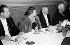 1940s dinner party honoring Finnish-Swedish composer Armas Järnefelt with guests Veikko Loppi, Mrs. Sylvi Rydman, and Mrs. Eva Paloheimo