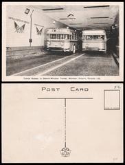 Two buses crossing the Detroit-Windsor Tunnel in 1945 as shown in a vintage postcard