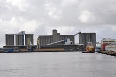 Panoramic view of Le Havre port with docked ships and industrial cranes