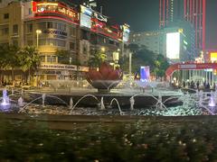 Bùng binh Cây Liễu roundabout with colorful flowers and green trees in Ho Chi Minh City