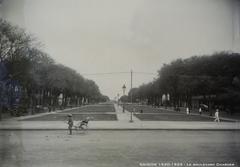 Boulevard Charner in Saigon during the 1920s showing street scene with colonial era buildings and vintage cars