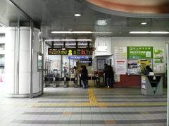 JR Nijo Station building with surrounding urban area and clear sky