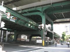 Bentencho Station elevates JR Loop Line and Municipal Subway Chuo Line crossing with shared bridge piers