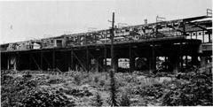 Morinomiya Station after air raid in 1945 with damaged exterior