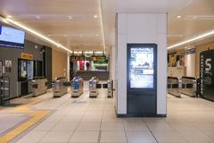 North exit ticket gate of JR West Morinomiya Station with clear signage and modern design