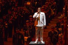 Musician 1st Class Cory Parker singing with U.S. Navy Band Cruisers during 2017 Virginia International Tattoo grand finale