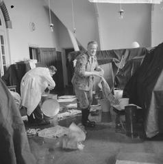 Fire in Tropenmuseum with staff mopping water in 1965
