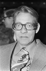 Albert Schweitzer memorial event at Tropenmuseum Amsterdam with Prof. Dr. Reinout Bakker speaking on stage, black and white photo